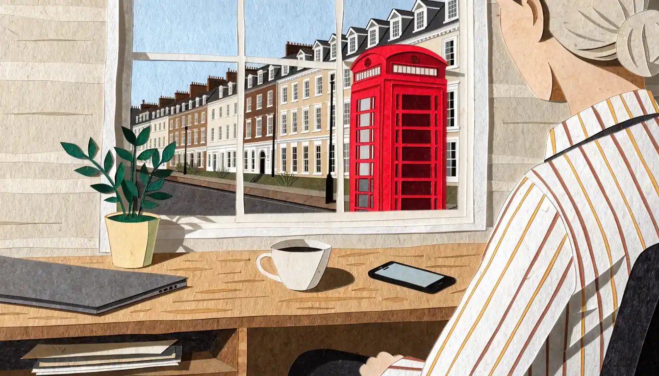 Closed laptop on a desk near a London window, representing safe licensed UK online gambling.